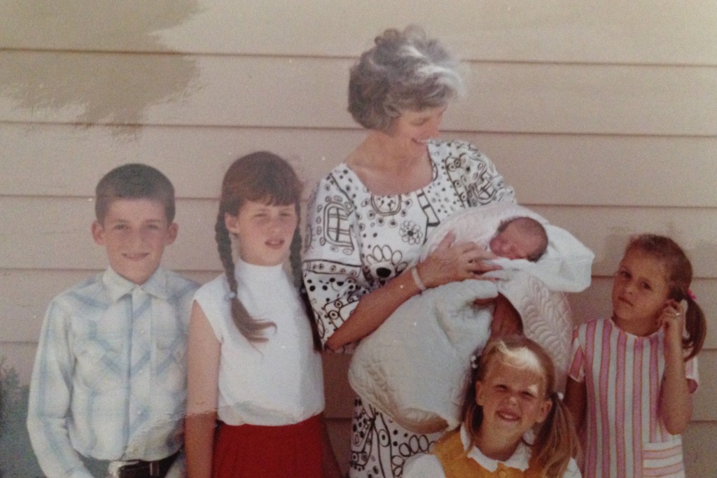 Joanne with Baby Lane and young siblings