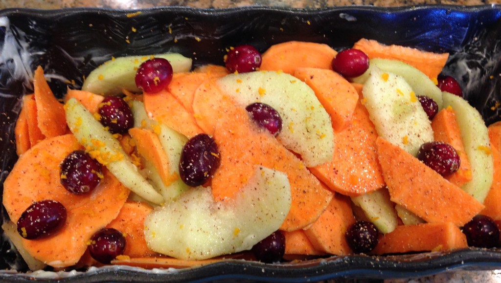 This dish is so easy to make. Simply peel and slice Granny Smith apples and some yams. Put fresh cranberries on top. Pour a little agave syrup on top and sprinkle with freshly ground (or not) cinnamon and nutmeg. A touch of salt finishes things off. (Fresh lemon zest doesn't hurt, either.) Bake at, well, say 375℉ for I'm not sure how long. It depends on how much you made! Better check on it after 30 minutes or when you start to smell good smells from the oven (if you are in the same room!).